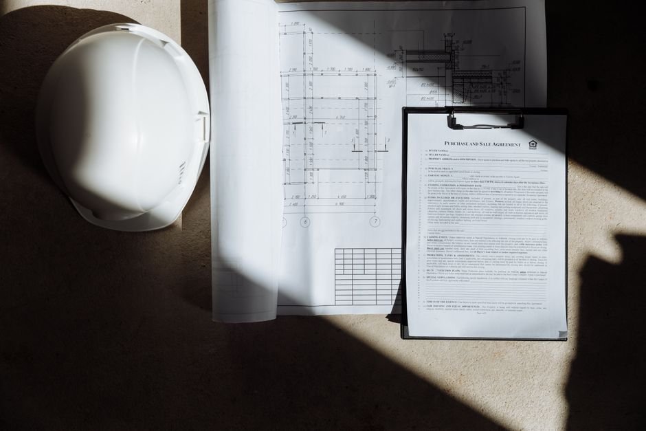 Borewell cost estimate documents and planning paperwork on site