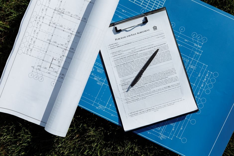 Borewell registration documents and permission paperwork with hard hat